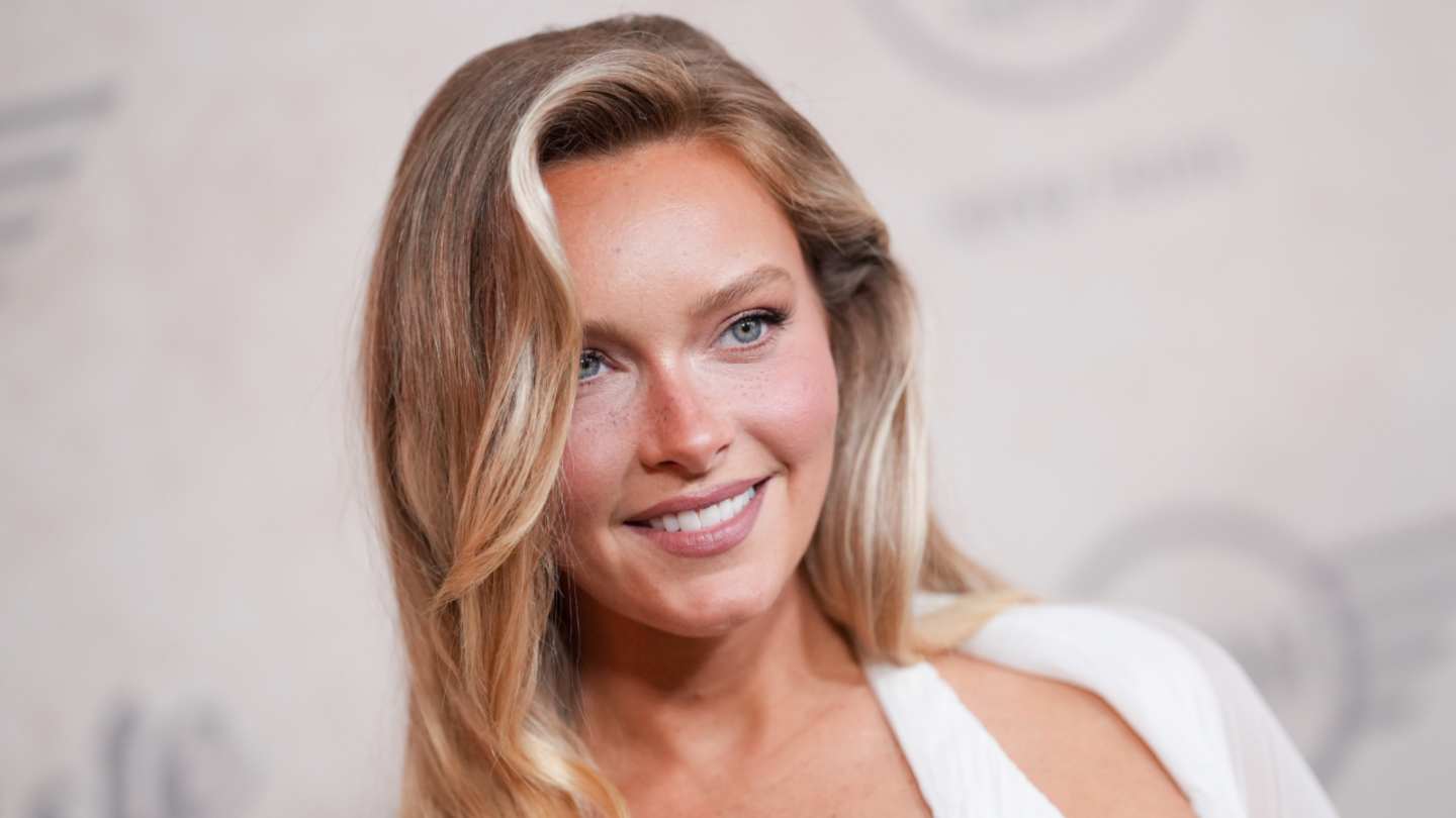 Camille Kostek's Lakeside Relaxation: A Floral Suit From Her New Line Camille Kostek's Lakeside Relaxation: A Floral Suit From Her New Line
