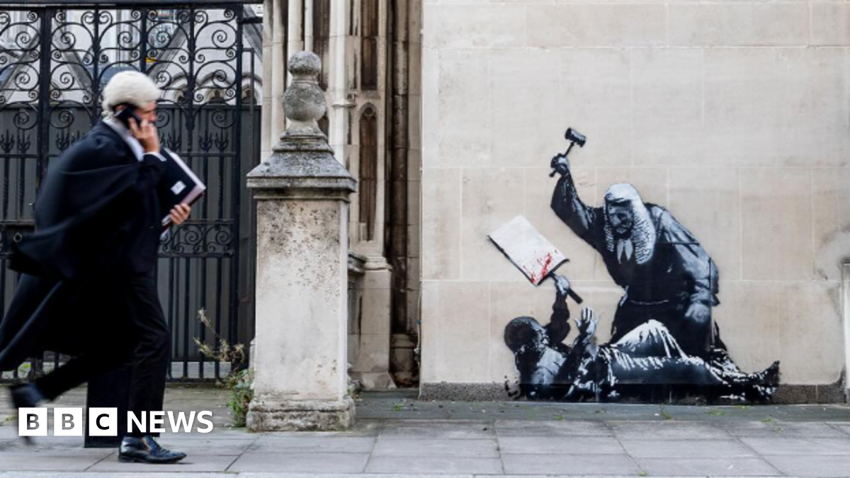 Confirmed: Banksy Mural At Royal Courts Of Justice Sparks Debate Confirmed: Banksy Mural At Royal Courts Of Justice Sparks Debate