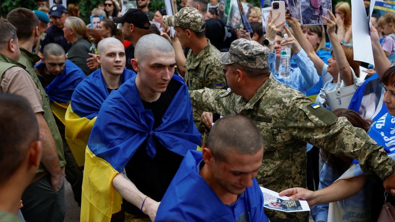 Years Of Captivity End: Ukrainian And Russian Soldiers Released In Prisoner Exchange Years Of Captivity End: Ukrainian And Russian Soldiers Released In Prisoner Exchange